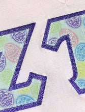 Load image into Gallery viewer, Sorority Apparel - Light Pink V-Neck With Easter Glitter Eggs On Metallic Purple Twill
